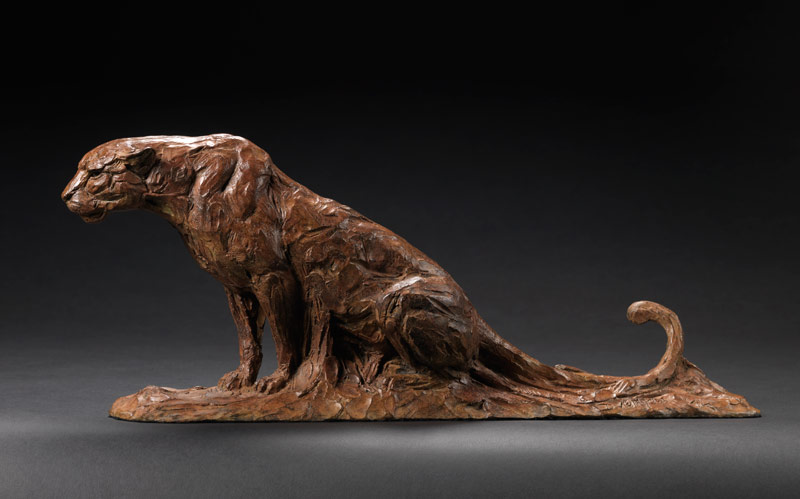Bronze Leopard sitting sculpture