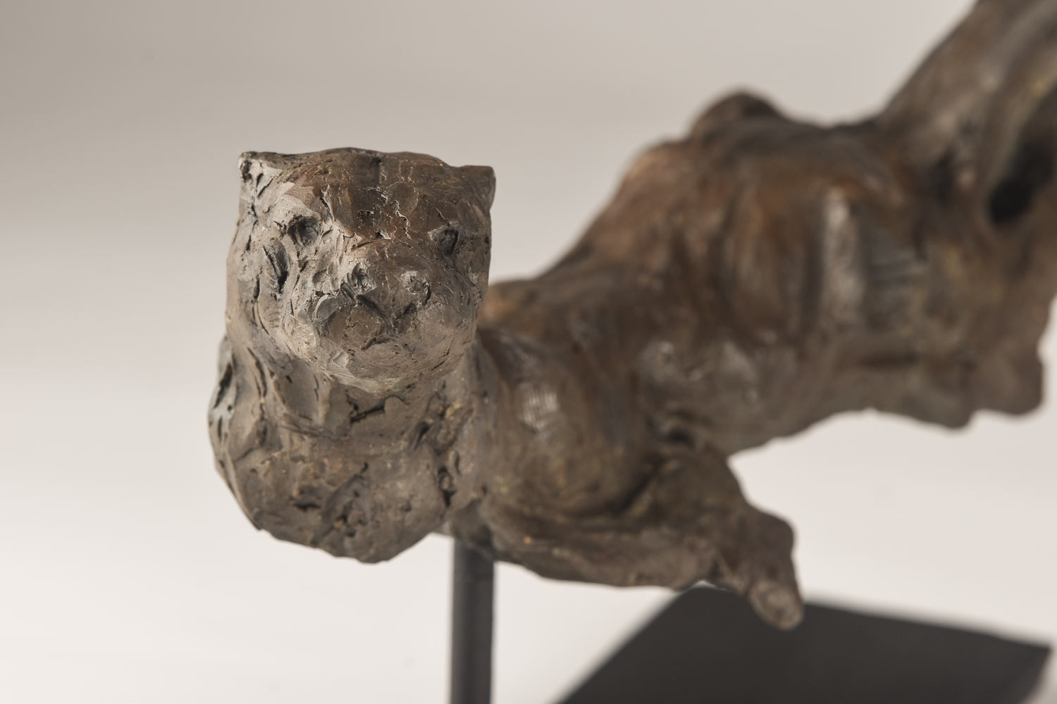 Swimming Otter sculpture in bronze